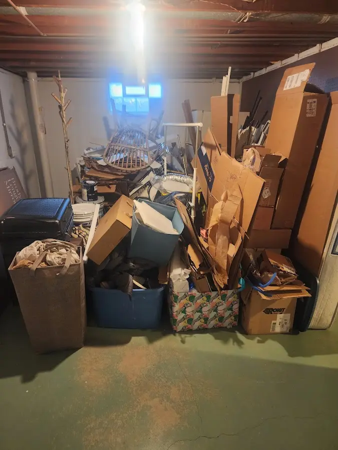 Roll-off dumpster container at job site for Yard Waste Dumpster Rental in Lynn